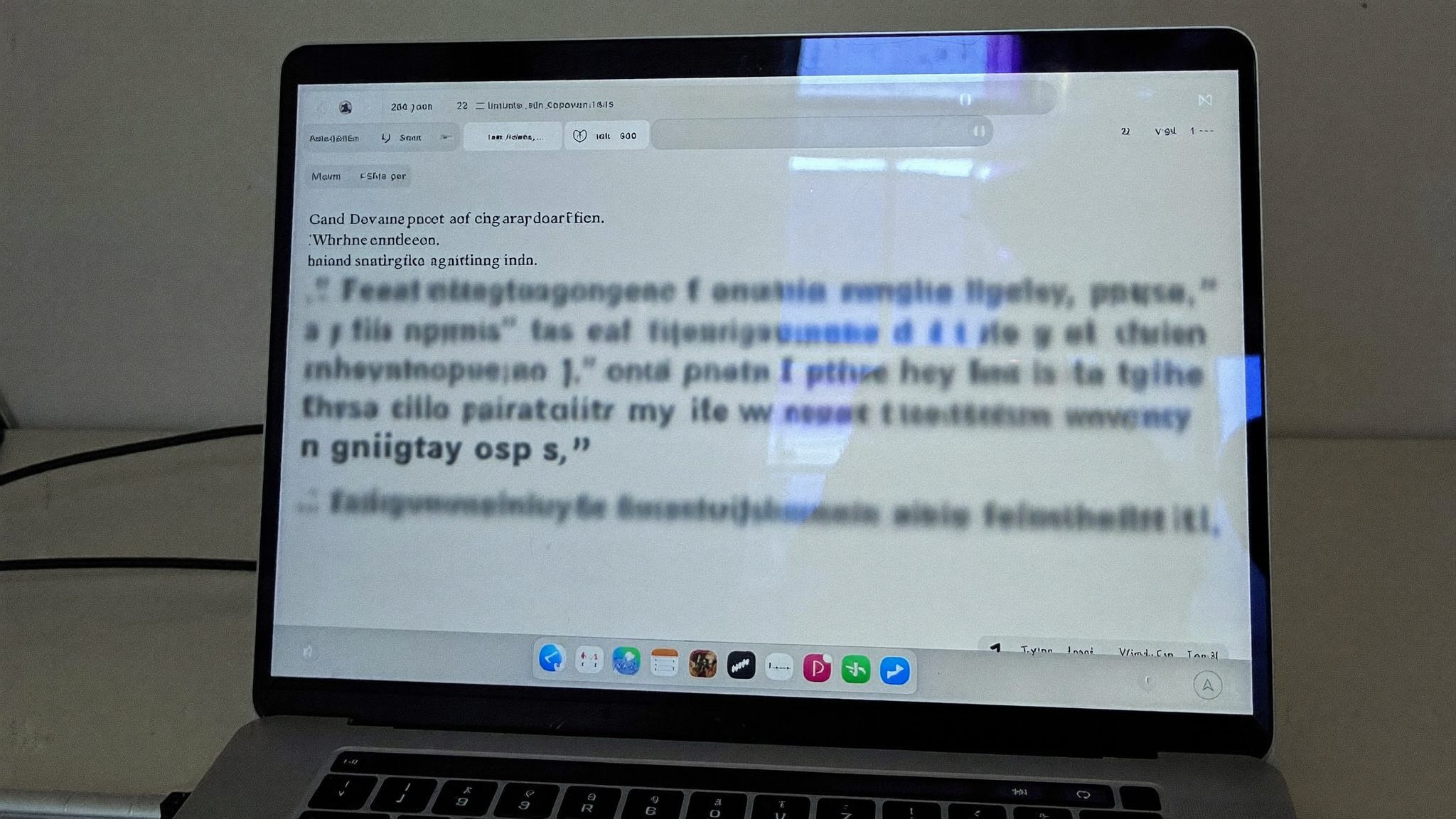 An AI assistant answer open on a laptop screen beside the pages it relied on.